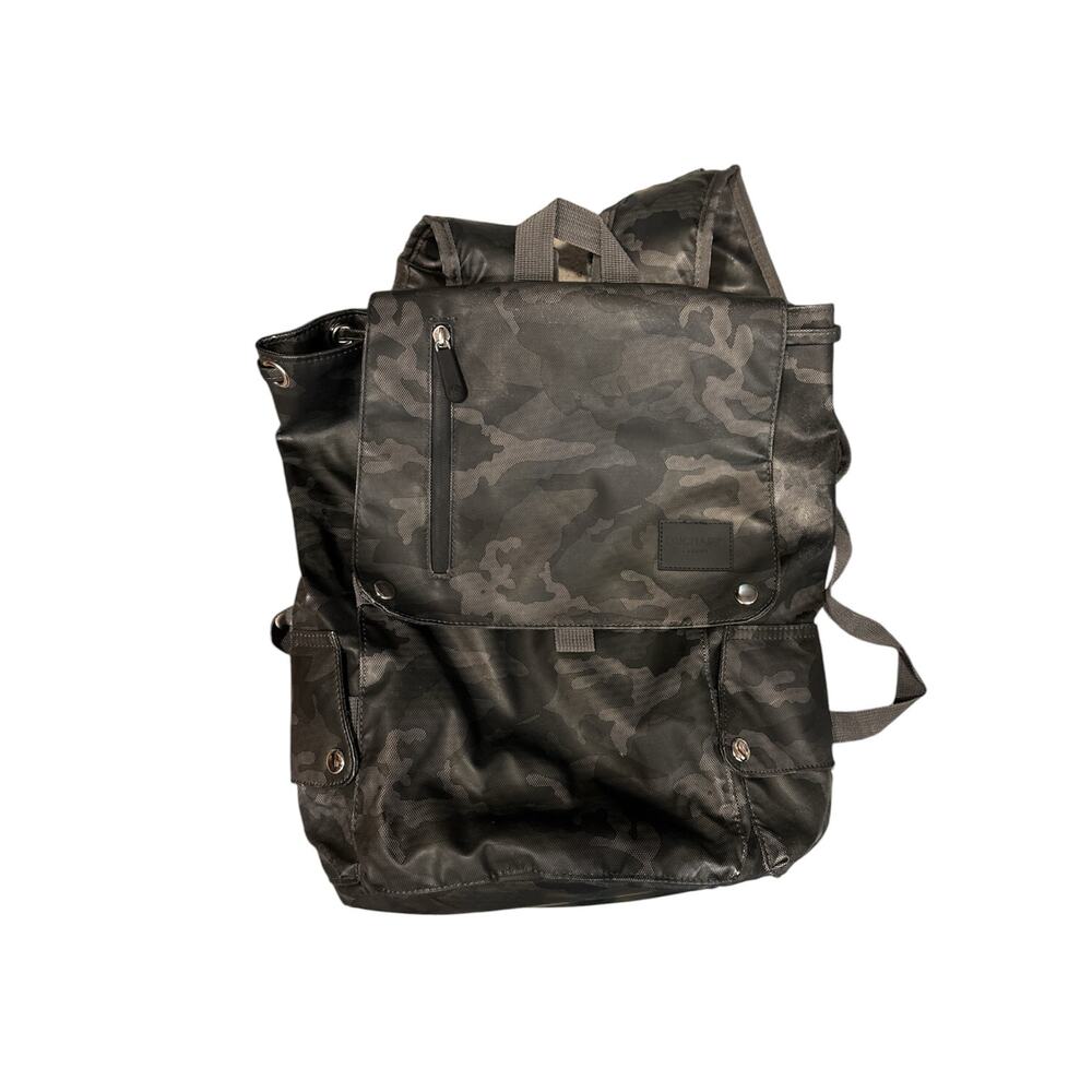 Duchamp flap over camo backpack in charcoal gray and black. Nylon material.